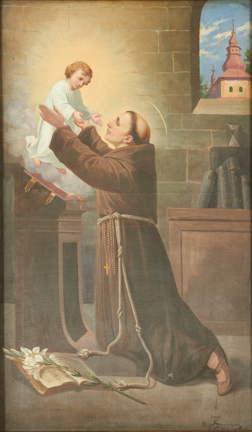 Obraz ołtarzowy w kościele w Trzemeśni z całościowym przedstawieniem klęczącego św. Antoniego Padewskiego przed ukazującym mu się pośród obłoków Dzieciątkiem Jezus. Scena we wnętrzu.