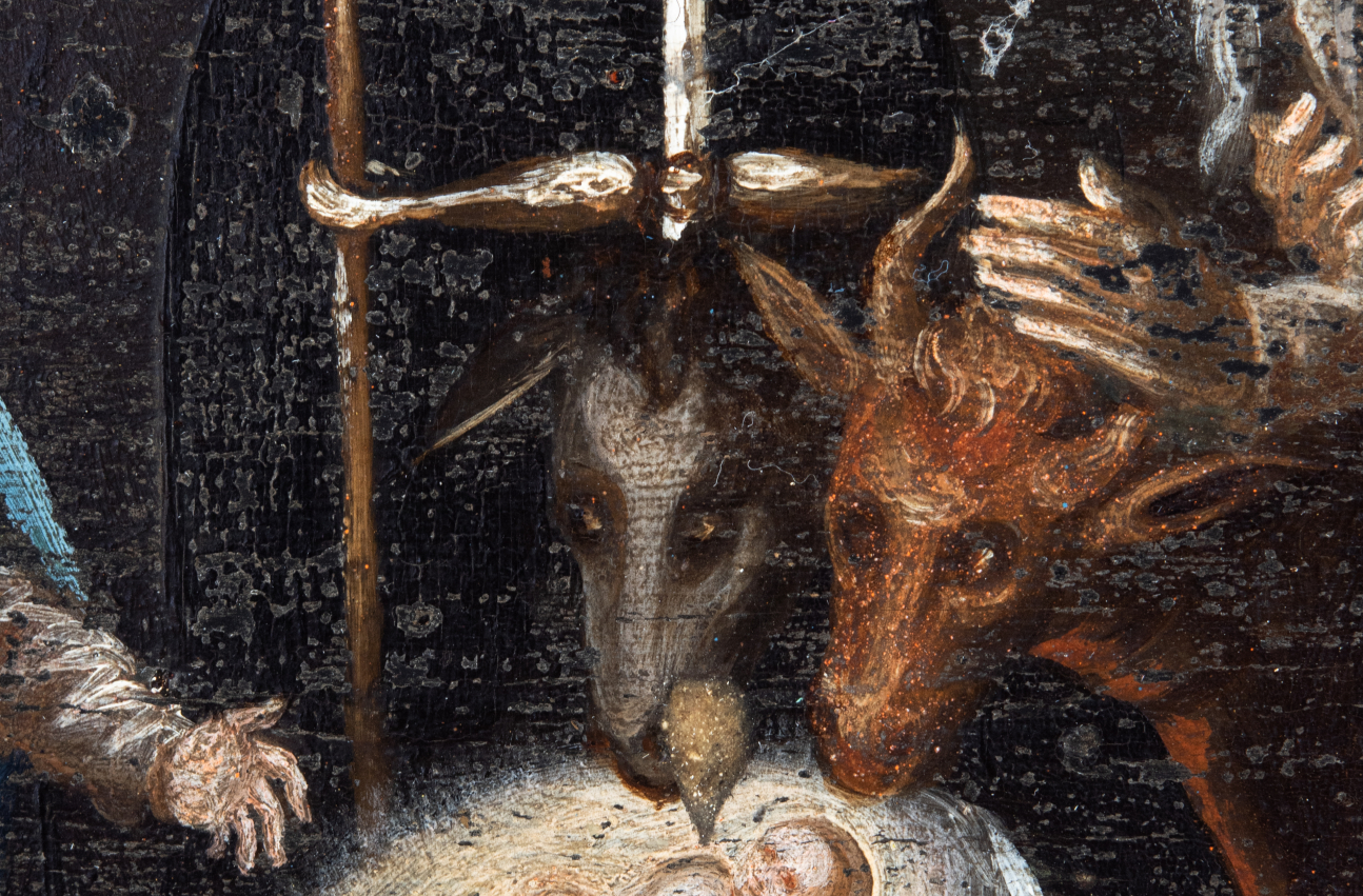 Zdjęcie 15. fragment obraz Pokłon pasterzy. W centrum widoczne Dzieciątko Jezus w żłobie i dwa woły