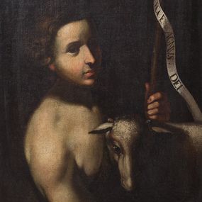 Zdjęcie nr 1: Obraz o kształcie stojącego prostokąta, w szerokiej, drewnianej ramie przedstawia św. Jana Chrzciciela z barankiem i banderolą z napisem &quot;ECCE AGNUS DEI&quot;. Święty ukazany w półpostaci, zwrócony w trzech czwartych w lewo. Jego twarz jest pociągła, włosy krótkie, kręcone. Obok niego widoczny baranek, z głową zwróconą frontalnie. W lewej ręce trzyma krzyż z banderolą. Tło gładkie, ciemne. 