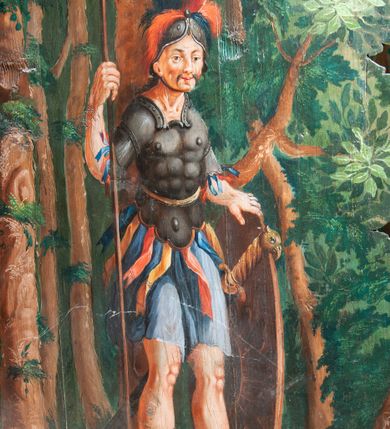 Zdjęcie nr 10: Oprawa grobu Pańskiego kulisowa, pięciopłaszczyznowa. Pierwszy plan tworzy iluzjonistyczna dekoracja, utworzona z bramy składającej się z dwóch filarów zwieńczonych wazonami z antabami oraz muru z krenelażem. Na tle muru ukazani dwaj rzymscy legioniści, po lewej stronie siedzący, po prawej stojący. W tle bogata roślinność egzotyczna z palmami. Na pozostałych planach namalowana roślinność leśna z egzotycznymi gatunkami palm. Na trzeciej parze kulis  przedstawieni dwaj rzymscy legioniści, lewy w pozycji stojącej, prawy leżącej, z głową wspartą na ręce. Wszystkie cztery płaszczyzny zamknięte łukami z namalowanym błękitnym niebem z gwiazdami, ujętym obłokami. 
Na ścianie zamykającej dekorację ukazano kamienny grób, po bokach którego siedzi i leży po trzech legionistów rzymskich z każdej strony. Nad nimi namalowane zalesione wzgórze Golgoty z trzema krzyżami, przed którymi stoi płaczący anioł. W tle widoczny jest pejzaż Jerozolimy, nad którym ukazano zaćmione słońce. W górnej części ściany ukazano niebo z nałożonym medalionem utworzonym z obłoków, z dwiema uskrzydlonymi główkami anielskimi, w glorii promienistej. 



