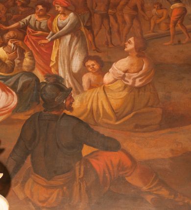 Zdjęcie nr 7: Obraz o kształcie leżącego prostokąta w profilowanej, drewnianej ramie dekorowanej złoconym ornamentem z umieszczonym u góry, na osi, złoconym, podłużnym kartuszem wolutowym zwieńczonym muszlą. W jego srebrzonym polu napis „TUTELARIUM / ECCLESIAE PAROCHIALIS / IN / NIEPOŁOMICE / DECEM MILLIUM MILITUM MARTIRUM / MARTIRII / HISTORIA". Wielopostaciowa, rozbudowana kompozycja ze sceną męczeństwa dziecięciu tysięcy męczenników. Po lewej stronie, na pierwszym planie ukazano dwór królewski z cesarzem Hadrianem wydającym rozkaz zabicia chrześcijan. Po prawej przedstawiono sceny obnażania z szat, prowadzenia spętanych chrześcijan, ustawiania krzyży i przybijania do nich męczenników i ich ustawiania. W tle las krzyży i odległy pejzaż z widocznym miastem – Aleksandria. W dolnej środkowej części kompozycji prostokątna tablica o profilowanych brzegach, zamknięta prostym belkowaniem. W polu, na ciemnym tle napis: I-II Martyres crucifixi sunt in Mon/te Ararat, sub Adriano Imperatore / prope Alexariam tempore mortis / Ipsorum haec signa apparueru[n]t / qua visa fuerunt sub tempus pas/sionis Christi”. Ciepła kolorystyka z przewagą brązów, mocno pociemniała. 
