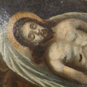 Zdjęcie nr 1: Obraz w formie owalnego medalionu, ujęty w srebrzoną ramę  utworzoną z wici suchego akantu. Przedstawia leżące w grobie, na białym całunie martwe ciało Chrystusa. Prawa ręka ułożona wzdłuż ciała, lewa spoczywa na biodrze; nogi lekko ugięte w kolanach. Sylwetka o wyraźnie zaznaczonej anatomii z widocznymi śladami męki. Twarz pociągła, okolona zarostem, oczy zamknięte, włosy długie, wokół głowy złoty nimb. Przez biodra przepasane jest ściśle opinające ciało perizonium. Kolorystyka obrazu ciemna i brunatna.