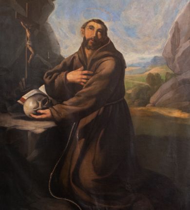 Zdjęcie nr 1: Obraz w kształcie stojącego prostokąta przedstawiający klęczącego pośród skał św. Franciszka z Asyżu. Święty ukazany całopostaciowo, zwrócony trzy czwarte w prawo, z głową lekko uniesioną, ukazaną na wprost. Prawa ręka złożona na piersi, lewa z czaszką w dłoni oparta o skałę. Twarz trójkątna, okolona zarostem i krótkimi włosami, oczy duże, wzrok skierowany ku górze, nos wydatny, szeroki, usta rozchylone, nad głową kolisty nimb. Święty ubrany jest w brązowy habit franciszkański, przewiązany długim sznurem. Po lewej stronie świętego krucyfiks i widoczny fragment otwartej księgi. Kolorystyka obrazu chłodna z przewagą błękitów i brązów. Sygnatura po prawej stronie u dołu: „Raczyński 1851”.