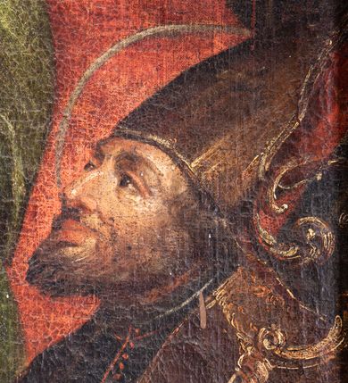 Zdjęcie nr 16: Obraz w kształcie stojącego prostokąta, w ramie rzeźbionej, malowanej, złoconej i ozdobionej ornamentem małżowinowym. Ukazuje św. Annę, Marię i Jezusa oraz świętych Wojciecha, Stanisława, Katarzynę i Tomasza. Na dwudzielnej ławie umieszczonej na podwyższeniu siedzi: po lewej stronie Najświętsza Maria Panna, po prawej św. Anna. Obie niewiasty zwrócone są ku stojącemu pomiędzy nimi Dzieciątku. Nagi Chrystus, okryty na skos białą chustą, przytrzymywaną na Jego prawym boku przez obie niewiasty, ukazany frontalnie, z wysuniętą ku przodowi prawą nóżką i lewą podtrzymywaną przez św. Annę. Prawą rękę wznosi w geście błogosławieństwa, zaś lewa obejmuje św. Annę. Głowę Chrystusa, ozdobioną jasno złotobrązowymi włosami, otacza promienista gloria. 
Najświętsza Maria Panna, lekko pochylona w kierunku Chrystusa, ubrana jest w czerwoną suknię i niebieski płaszcz założony na lewe ramię. Jej głowa jest nakryta jasnozieloną chustą, związaną z tyłu głowy, spod której wyłaniają się jasnobrązowe włosy. Twarz Marii zwrócona jest ku widzowi, ze wzrokiem skierowanym na wprost. Święta Anna w zielonej sukni i ciemnoczerwonym płaszczu, narzuconym na prawe ramię mocno pochyla się ku Chrystusowi. Głowę świętej przykrywa biała chusta ze złotymi przeszyciami, opadająca na plecy i prawe ramię. Spod chusty widoczne siwe włosy. Twarz św. Anny ukazana jest półprofilu, ze wzrokiem skierowanym ku Marii. Nad głowami Marii i św. Anny unoszą się nimby. Na pierwszym planie, u stóp niewiast klęczą zwróceni ku Jezusowi: po lewej stronie św. Wojciech w stroju biskupim, z paliuszem i z leżącym przed nim na ziemi pastorałem z podwójnym krzyżem, po prawej św. Stanisław, w stroju biskupim, z pastorałem w lewej ręce i postacią Piotrowina wyłaniającą się z grobu. W tle po prawej stronie św. Katarzyna, trzymająca miecz we wspartej na kole prawej dłoni i palmę męczeństwa w lewej, ubrana w zielona suknię i szary płaszcz. Obok niej stoi św. Tomasz, z prawą dłonią złożoną na piersi, z lilią w lewej ręce, ubrany w czarny habit. Za postaciami świętych daleki górski pejzaż. Po lewej stronie obrazu, na tle architektury z podwieszonymi ciemnoniebieskimi kotarami ozdobionymi złocistymi frędzlami i chwostem, widnieją popiersia dwóch świętych starców w jasnobrązowych szatach. Głowy świętych otaczają nimby. W górnej części, na osi obrazu popiersie Boga Ojca z trójkątnym nimbem, poniżej gołębica Ducha Świętego, otoczona promienistą glorią. Kolorystyka obrazu stonowana, ciepła, nasycona. Kolorystyczną dominantę stanowi ciemny błękit płaszcza Marii, czerwień płaszcza i zieleń sukni św. Anny. Kolory te podkreślają jasną postać Chrystusa.