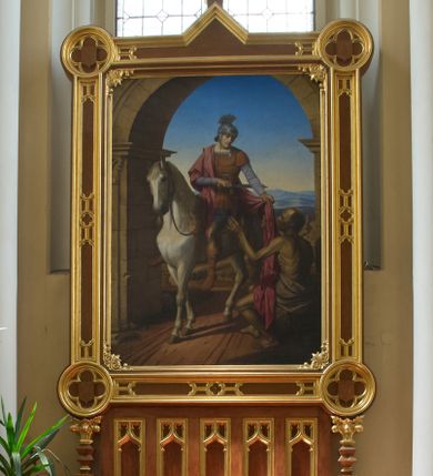 Zdjęcie nr 4: Obraz w kształcie stojącego prostokąta. Pod półkolistą arkadą święty Marcin na białym koniu, ujęty en face, pochyla głowę w prawo, ku klęczącemu żebrakowi, który ujmuje podawaną mu połę płaszcza. W prawej ręce święty trzyma ułożony poziomo bułat (rodzaj krótkiej szabli). Odziany w zbroję i czerwony płaszcz przerzucony przez prawe ramię. Żebrak ukazany z profilu, z obnażonym torsem oraz biodrami i udami okrytymi niebieską tkaniną. W tle przedstawienia niebieskie niebo i daleki górzysty pejzaż. Obraz sygnowany: FP 1843-45.