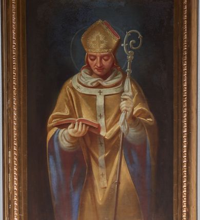 Zdjęcie nr 1: Obraz w formie stojącego prostokąta. W centrum św. Stanisław ukazany frontalnie, do kolan, z pochyloną głową. W lewej ręce trzyma pastorał, w prawej, ugiętej podtrzymuje otwartą księgę. Twarz ma trójkątną, o dużych oczach, skierowanych w dół, dużym nosie i pełnych ustach. Ubrany jest w białą rokietę oraz obfity żółty ornat z niebieską podszewką, na piersi ma zawieszony paliusz, na głowie żółtą infułę z dekoracyjnym galonem i krzyżem z przodu. Postać ukazana na cieniowanym brązowo-niebieskim tle. Na okładce książki sygnatura „Wojciech Eljasz 1876”. 