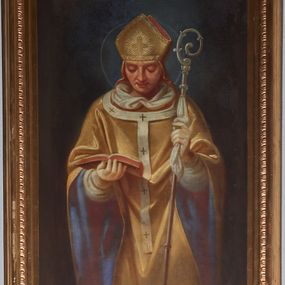 Zdjęcie nr 1: Obraz w formie stojącego prostokąta. W centrum św. Stanisław ukazany frontalnie, do kolan, z pochyloną głową. W lewej ręce trzyma pastorał, w prawej, ugiętej podtrzymuje otwartą księgę. Twarz ma trójkątną, o dużych oczach, skierowanych w dół, dużym nosie i pełnych ustach. Ubrany jest w białą rokietę oraz obfity żółty ornat z niebieską podszewką, na piersi ma zawieszony paliusz, na głowie żółtą infułę z dekoracyjnym galonem i krzyżem z przodu. Postać ukazana na cieniowanym brązowo-niebieskim tle. Na okładce książki sygnatura „Wojciech Eljasz 1876”. 