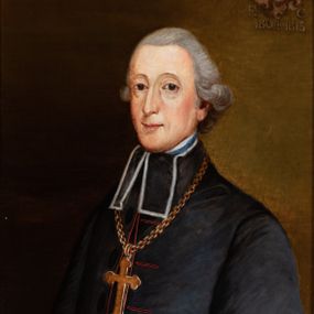 Zdjęcie nr 1: Portret biskupa w czarnej sutannie z kołnierzem i pektorałem na piersi. W prawym górnym rogu otoczona labrami tarcza z godłem herbu Rawicz ze skrzyżowanymi infułą i pastorałem oraz literami A[NDREAS] [GAWROŃSKI] E[PISCOPUS] C[RACOVIENSIS]. 