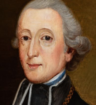 Zdjęcie nr 2: Portret biskupa w czarnej sutannie z kołnierzem i pektorałem na piersi. W prawym górnym rogu otoczona labrami tarcza z godłem herbu Rawicz ze skrzyżowanymi infułą i pastorałem oraz literami A[NDREAS] [GAWROŃSKI] E[PISCOPUS] C[RACOVIENSIS]. 