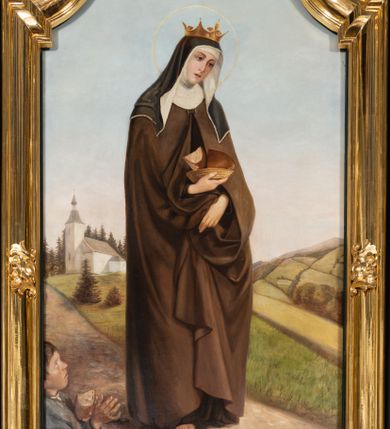 Zdjęcie nr 3: Nastawa architektoniczna, jednoosiowa, jednokondygnacyjna ze zwieńczeniem, ustawiona na dwustrefowym cokole z wyodrębnionymi dwoma prostopadłościanami. Ołtarz prostopadłościenny, z drewnianą mensą. Antepedium ujęte profilowaną, złoconą ramą, na tle fioletowego pola mandorla z chrystogramem Chi Rho oraz literami alfa i omega, w glorii promienistej. Cokół w górnej strefie dekorowany płycinami wypełnionymi akantem. Nastawa flankowana parą kolumn o kapitelach kompozytowych, dźwigających pełne belkowanie, wyłamane pod kątem na ich osi, z siedzącymi na nim puttami, o fryzie dekorowanym rozetami. Pole centralne niemal w całości wypełnione wnęką ujętą profilowaną ramą zdobioną miejscami ornamentem roślinnym, w formie stojącego prostokąta o wklęsłych górnych narożach. We wnęce obraz z przedstawieniem św. Antoniego Padewskiego, na zasuwie św. Elżbiety Węgierskiej. Nad obrazem, w polu belkowania kartusz utworzony z akantu, kampanuli i liści z napisem „S(ANC)T(E) ANTONI / ORA PRO NOBIS”. Kondygnacja ujęta uszami utworzonymi z akantu i kampanuli. Zwieńczenie w formie stojącego prostokąta o lekko wklęsłych bokach, zamknięte fragmentem falistego gzymsu, na którym siedzi putto i uskrzydlona główka anielska. W polu obraz Chrystusa dźwigającego krzyż w formie stojącego owalu, ujęty ramą zdobioną wieńcem laurowym. Zwieńczenie dekorowane w polu czterema rozetami, flankowane uszami z akantu. Struktura polichromowana w kolorze zielonym, ze złoconymi kolumnami, profilami i ornamentyką. 