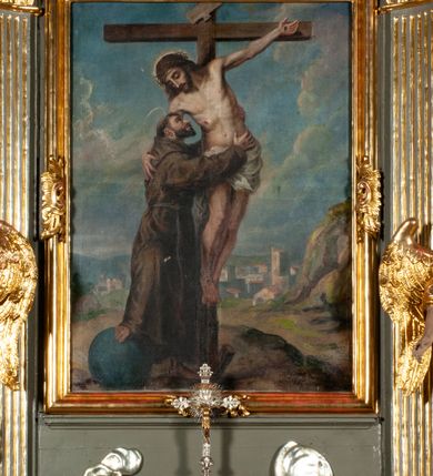 Zdjęcie nr 2: Obraz w kształcie stojącego prostokąta ukazuje wizję św. Franciszka. Święty obejmuje ciało wiszacego na krzyżu Chrystusa. W tle widok Jerozolimy. W prawym dolnym rogu sygnatura "m[alował] X[iądz] D[oktor] J[ózef] K[aczmarczyk] / 1907".