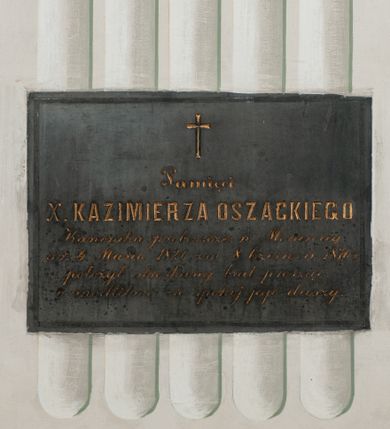 Zdjęcie nr 1: Epitafium w formie leżącego prostokąta z inskrypcją: "Pamięci / X(iędza) KAZIMIERZA OSZACKIEGO / Kanonika proboszcza w Morawicy / ur(odzonego) 4 Marca 1826 zm(arłego) 8 Czerwca 1876 r(oku) / położył stroskany brat prosząc / o modlitwę za spokój jego duszy." 