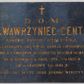 Zdjęcie nr 1: Płyta w kształcie leżącego prostokąta wypełniona inskrypcją.

Inskrypcja:

D.O.M. / KS. WAWRZYNIEC CENTT / KANONIK KATEDRY PODLASKIEJ, / B. PROBOSZCZ SULEJEWSKI DZIEKAN PIOTRKOWSKI, REKTOR X.X. EMERYTÓW, RESTAURATOR KOŚCIOŁA ŚW. MARKA / UR. W KOŹMINKU W KRÓL. – POL. 5/8 1823 R. / ZM. W KRAKOWIE 8/8 1905 R. / BOŻE! DAJ DUSZY JEGO SPOKÓJ WIECZNY.