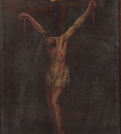 Zdjęcie nr 1: Chrystus wiszący na krzyżu, ukazany na jednolitym, ciemnym tle.